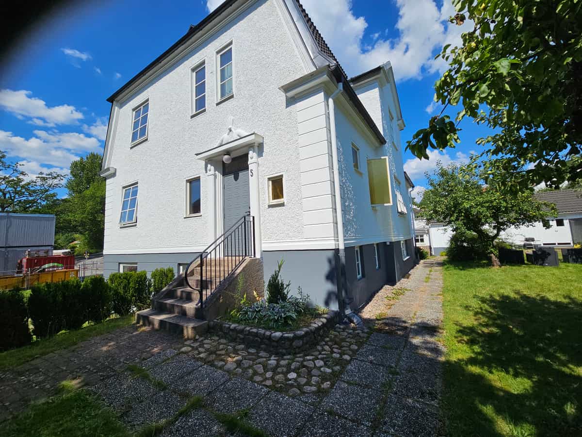 Fasadrenovering av villa utförd av Jana Bygg AB i Borås